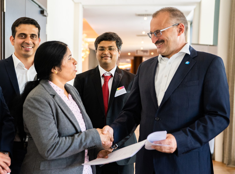 CONTACT’s CEO Karl Heinz Zachries congratulates V. R. Saraswathi, Practice Head PLM Solutions at Robert Bosch Engineering and Business Solution, to the certification